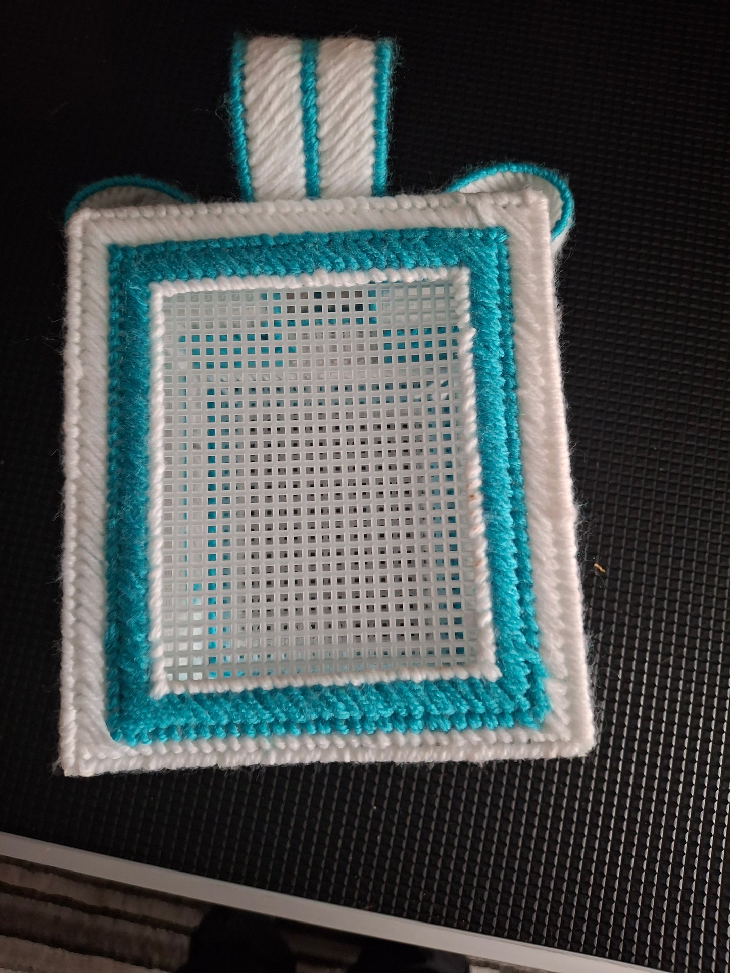 Tissue box with photograph pockets