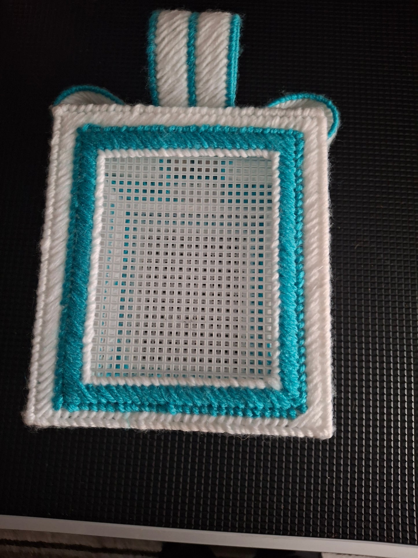 Tissue box with photograph pockets