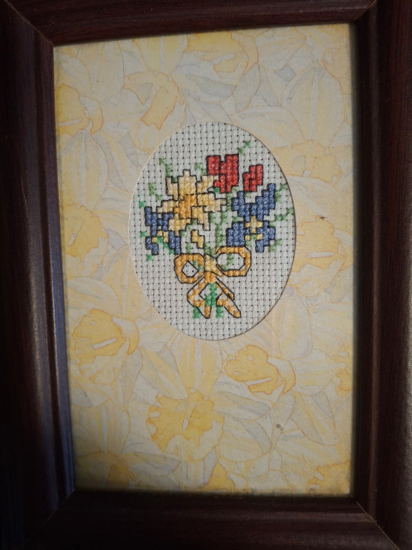 Floral design cross stitched