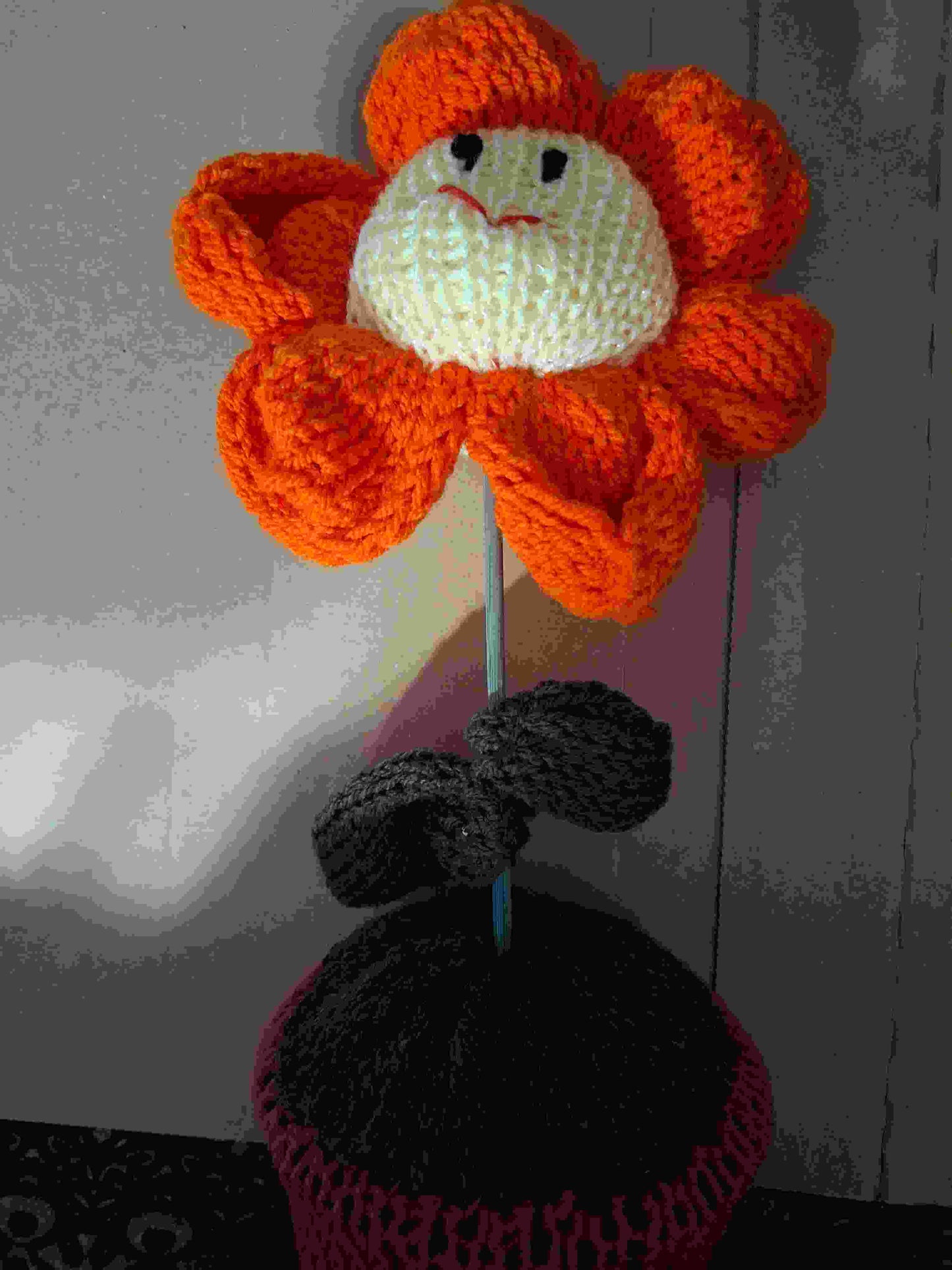 Knitted flower with pot slightly scented
