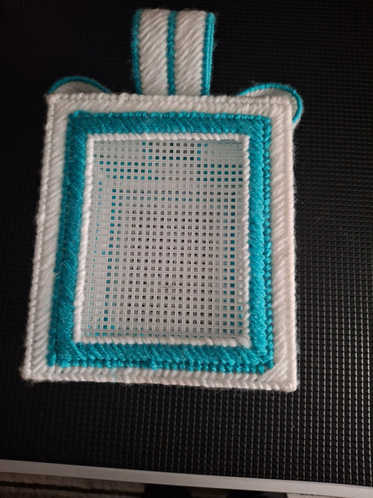 Tissue box with photograph pockets