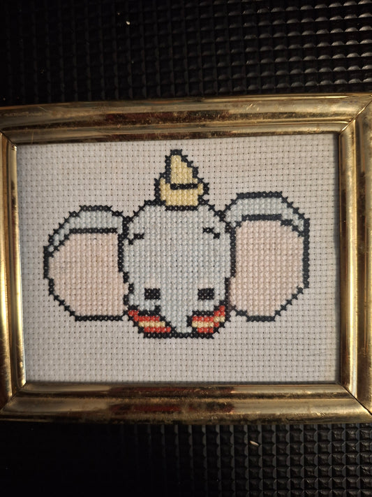 Dumbo design cross stitched