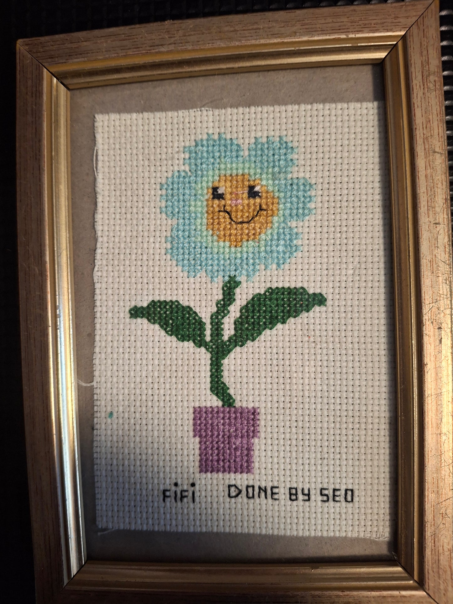 Fifi forget me not design cross stitched