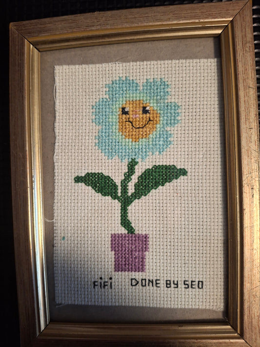 Fifi forget me not design cross stitched