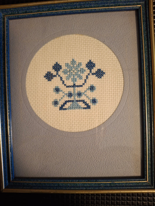 Floral design cross stitched