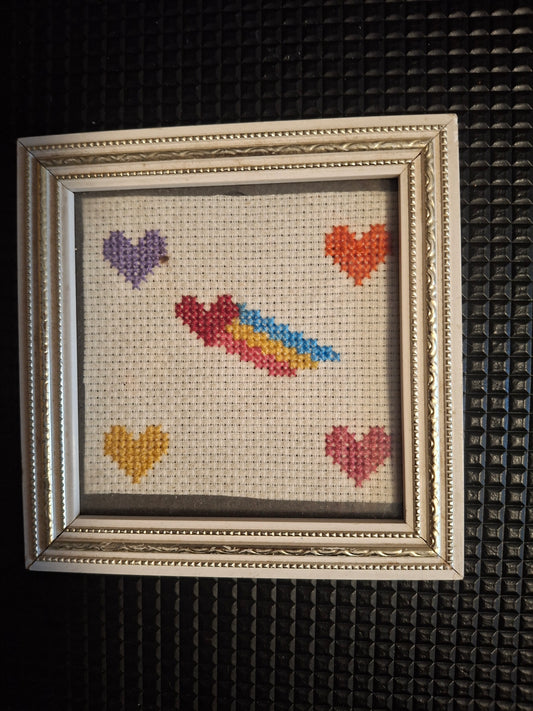 Love heart design cross stitched