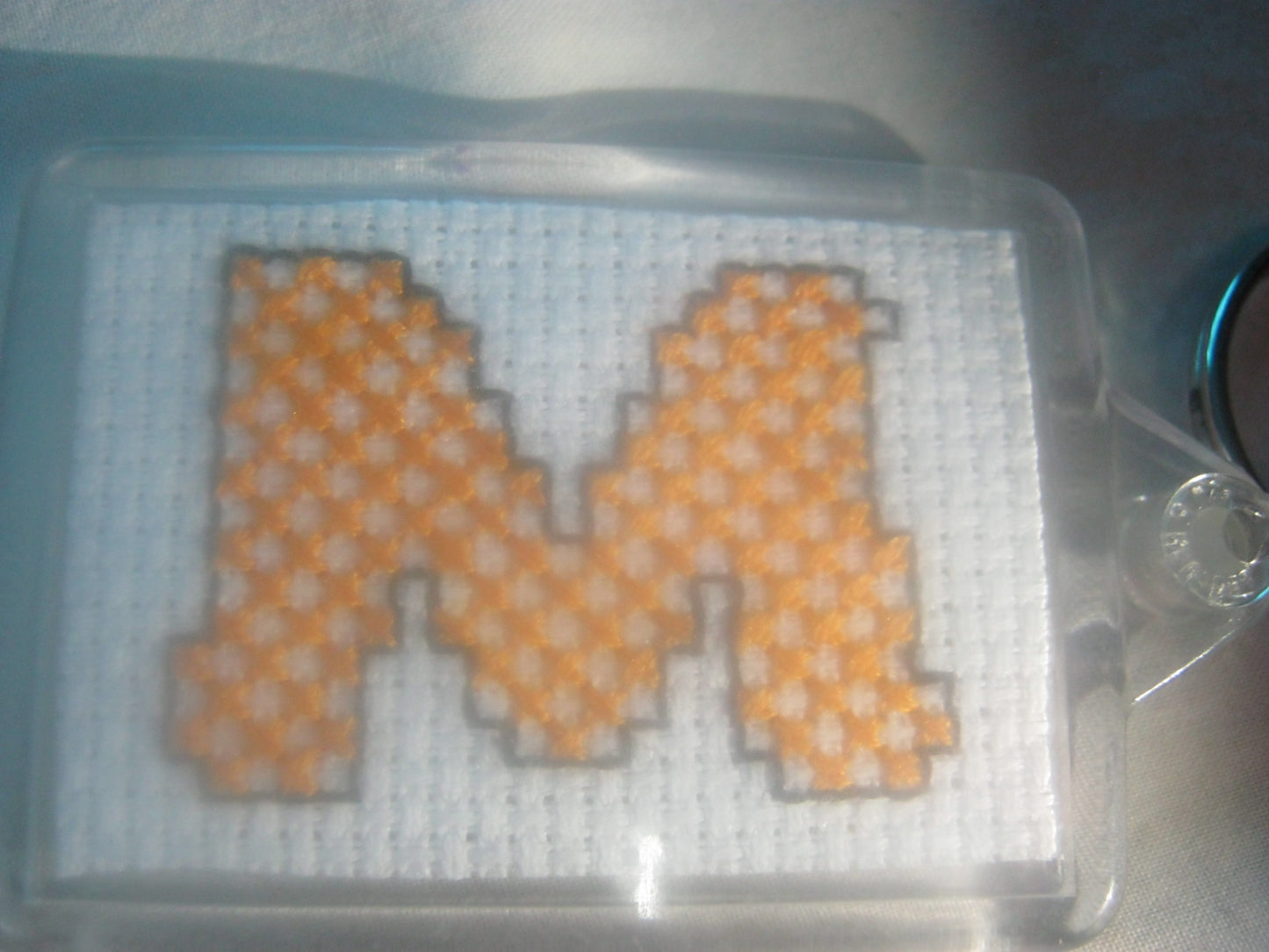 alphabet cross stitched  keyrings