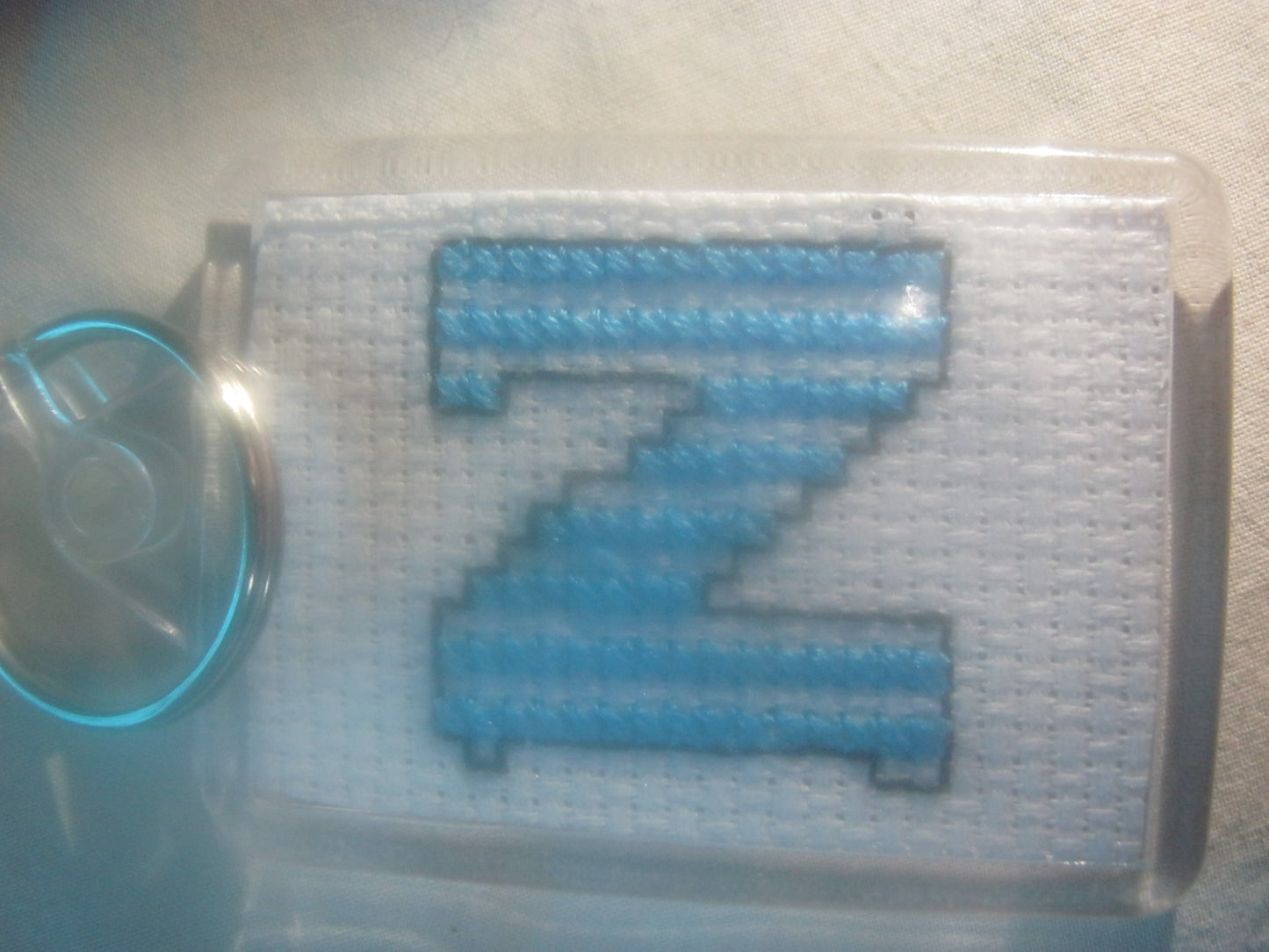 alphabet cross stitched  keyrings