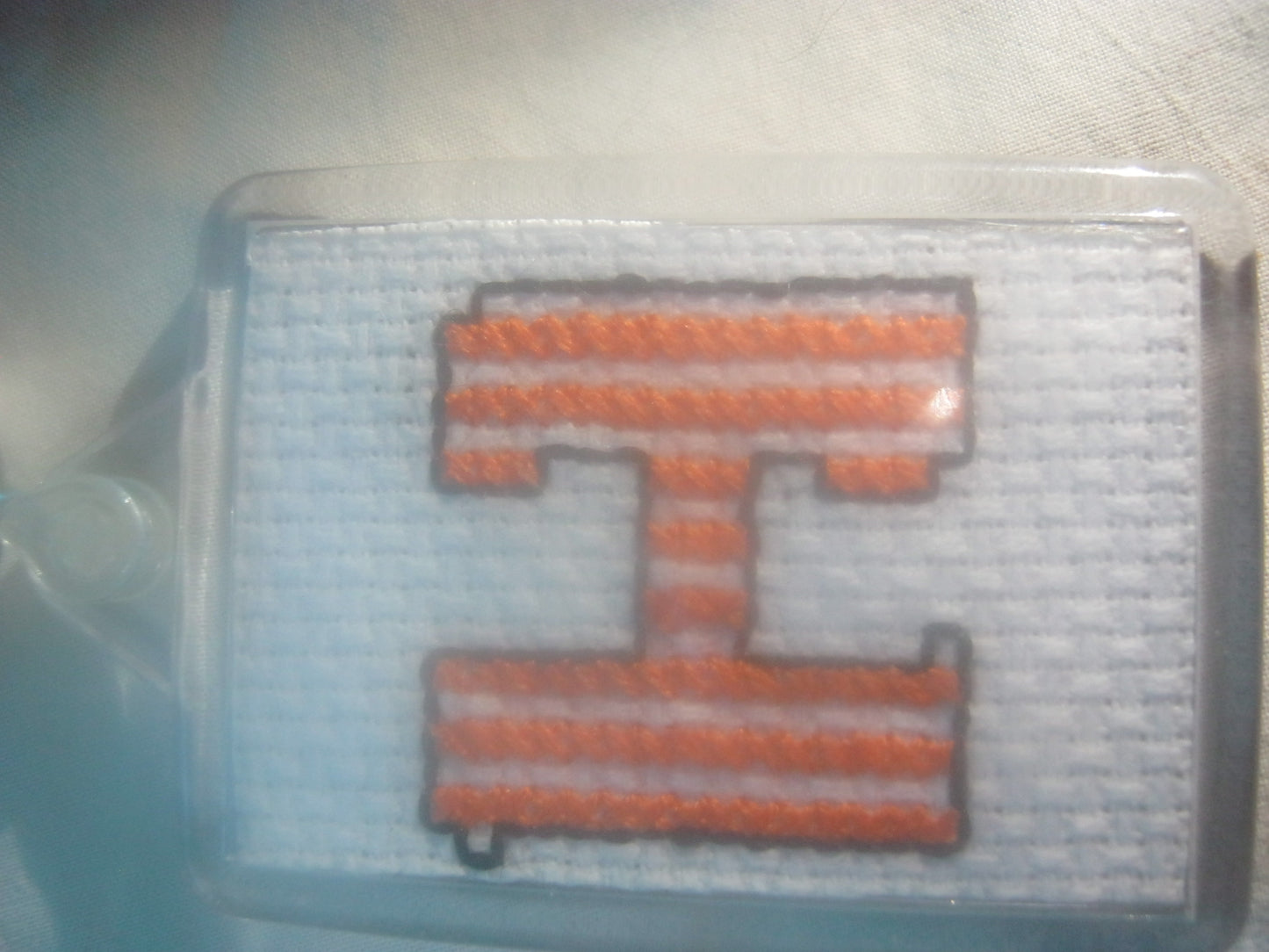 alphabet cross stitched  keyrings