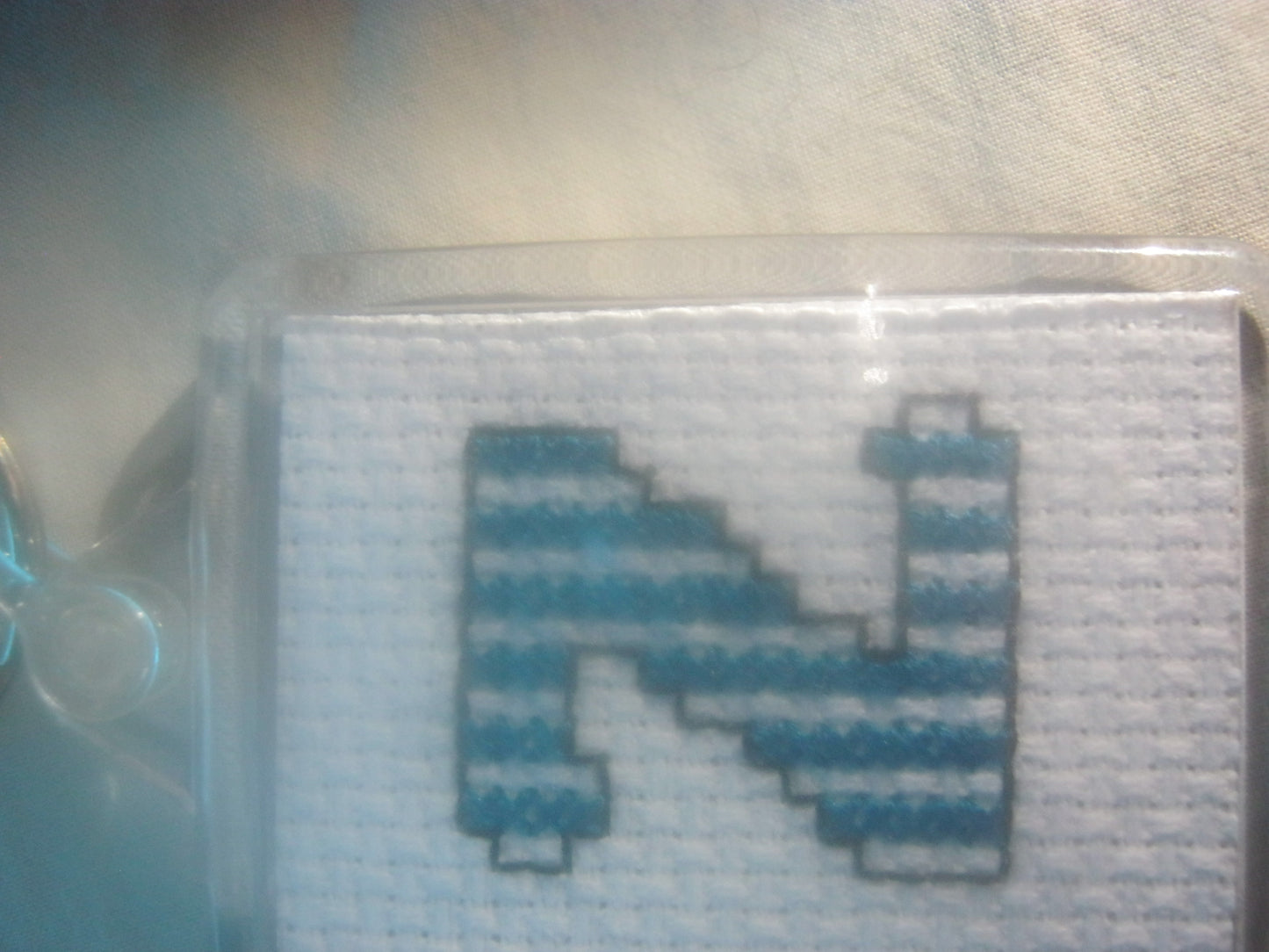 alphabet cross stitched  keyrings