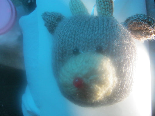 assortment of keyrings that are knitted or crocheted