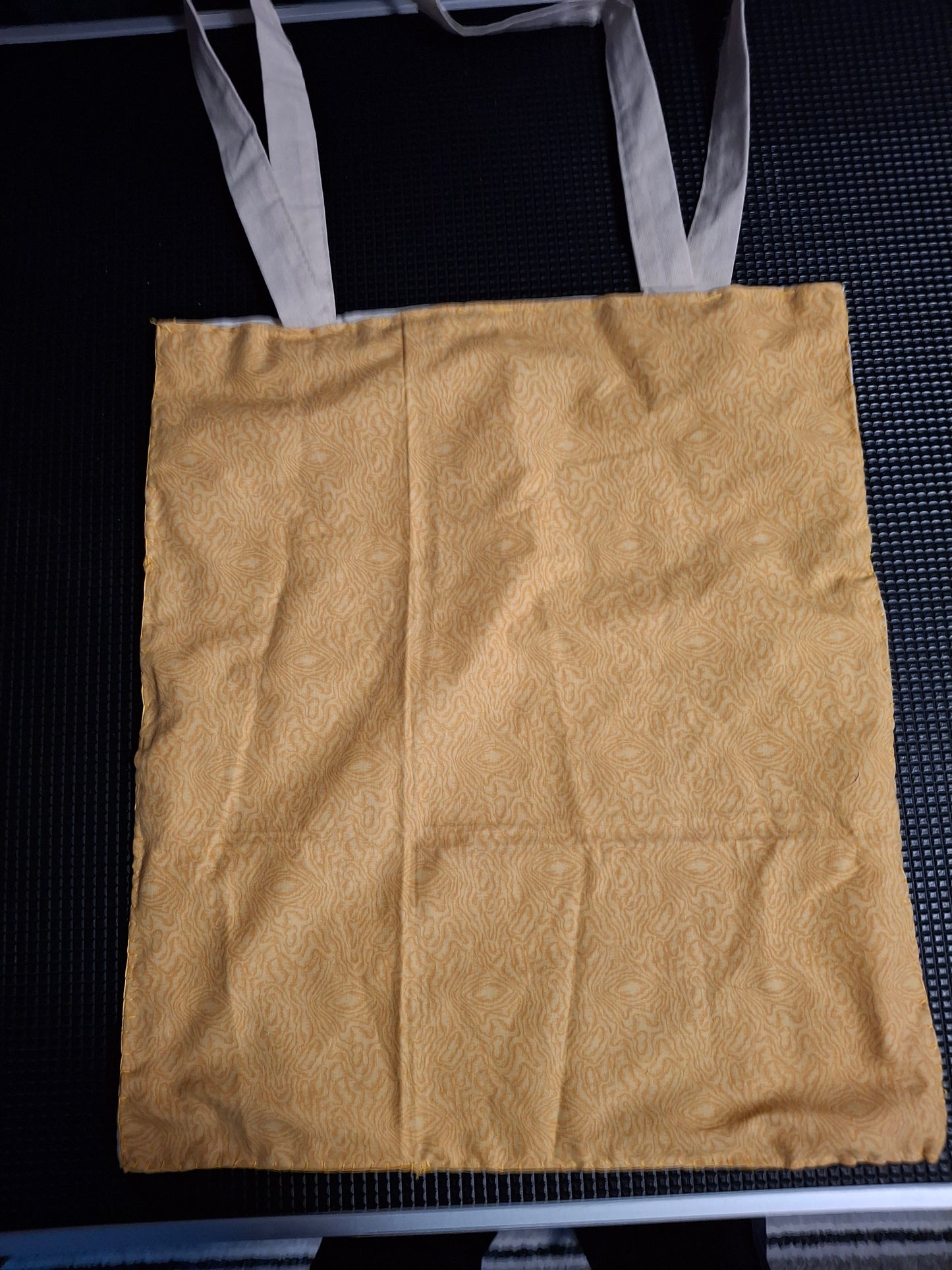 tote bags with material stitched to bag for a little design