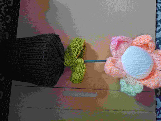 Knitted flower with pot slightly scented